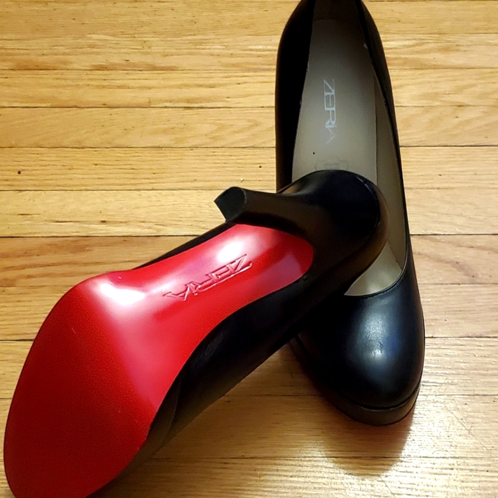 Red sole leather heel